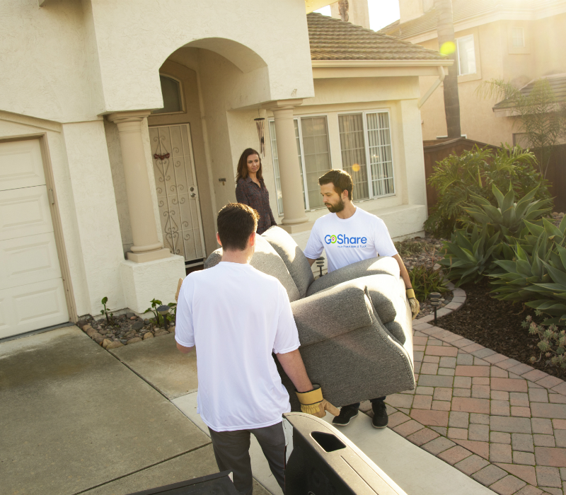 https://wpcdn.goshare.co/wp-content/uploads/2019/02/GoShare-Pros-Delivering-Couch-Furniture-800x700.jpg